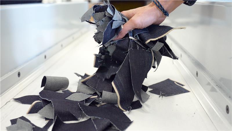 Cut textile pieces before tearing process